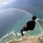 TK skydives into a rainbow over Hawaii
