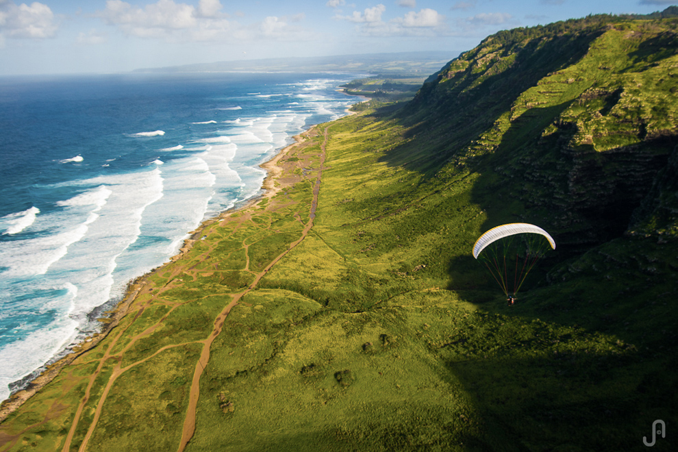 Paragliding over Kaena Point in Hawaii by Jorge Atramiz