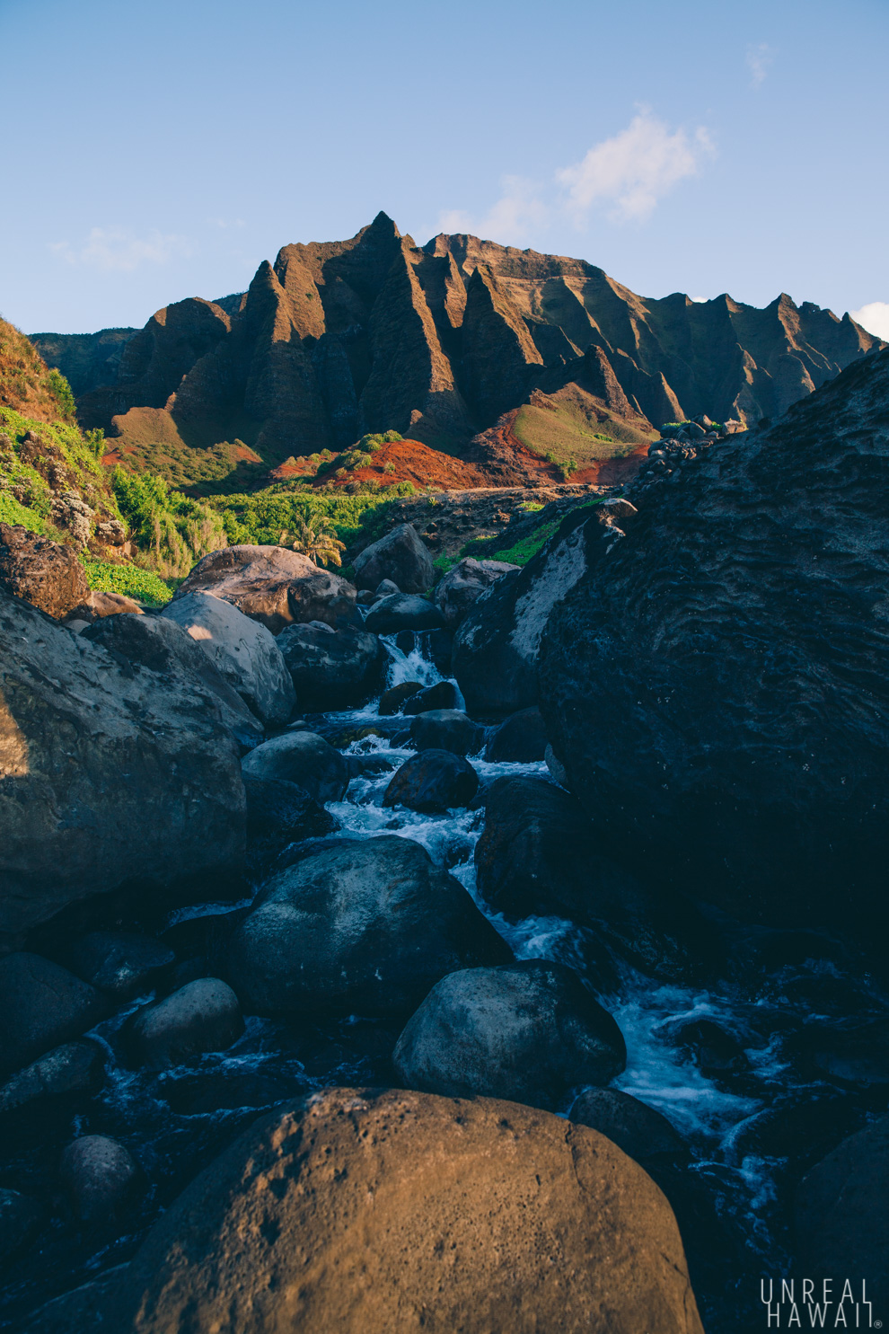 Kalalau Stream and the cliff of Kalalau Valley in the late afternoon. Kauai, Hawaii.